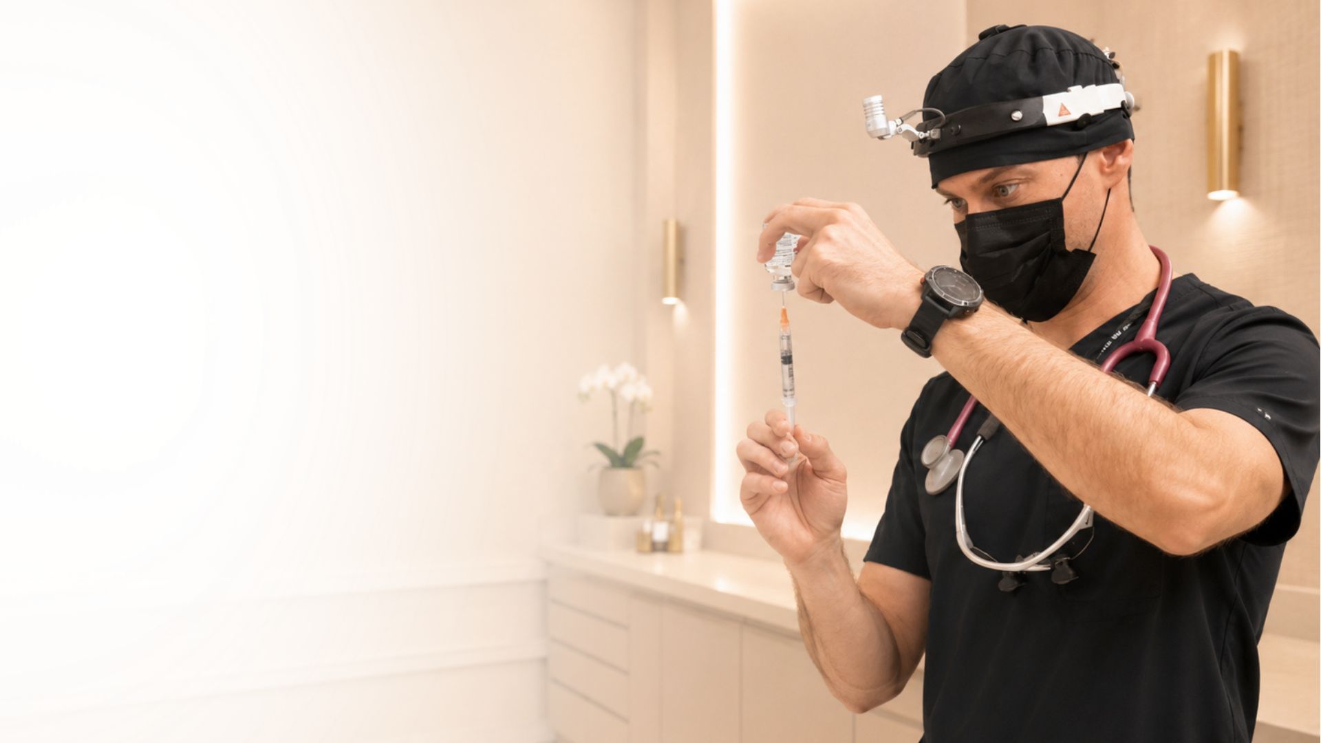 Miami's oral surgeon preparing dental sedation treatment at Love Your Jaws Surgery Center.